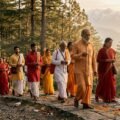 Pilgrims reciting Vaishno Devi mantras with japa malas on Trikuta hills yatra route to Mata cave