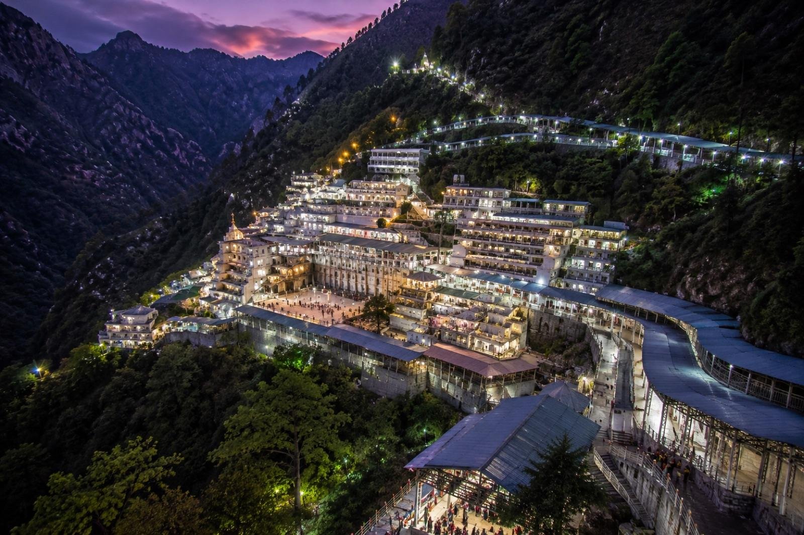 Bhawan complex during blue hour with mountain backdrop