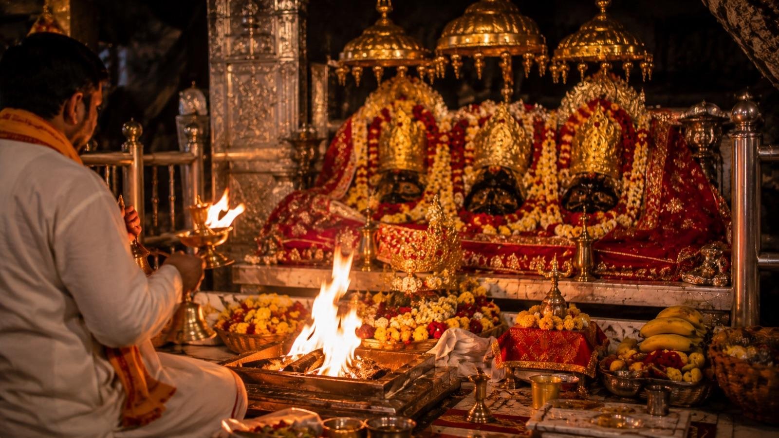 Morning aarti at Mata Vaishno Devi Bhawan being performed by the priest before the Trishakti Pindis